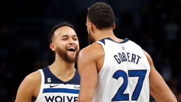 Minnesota Timberwolves forward Kyle Anderson (5) and center Rudy Gobert (27).